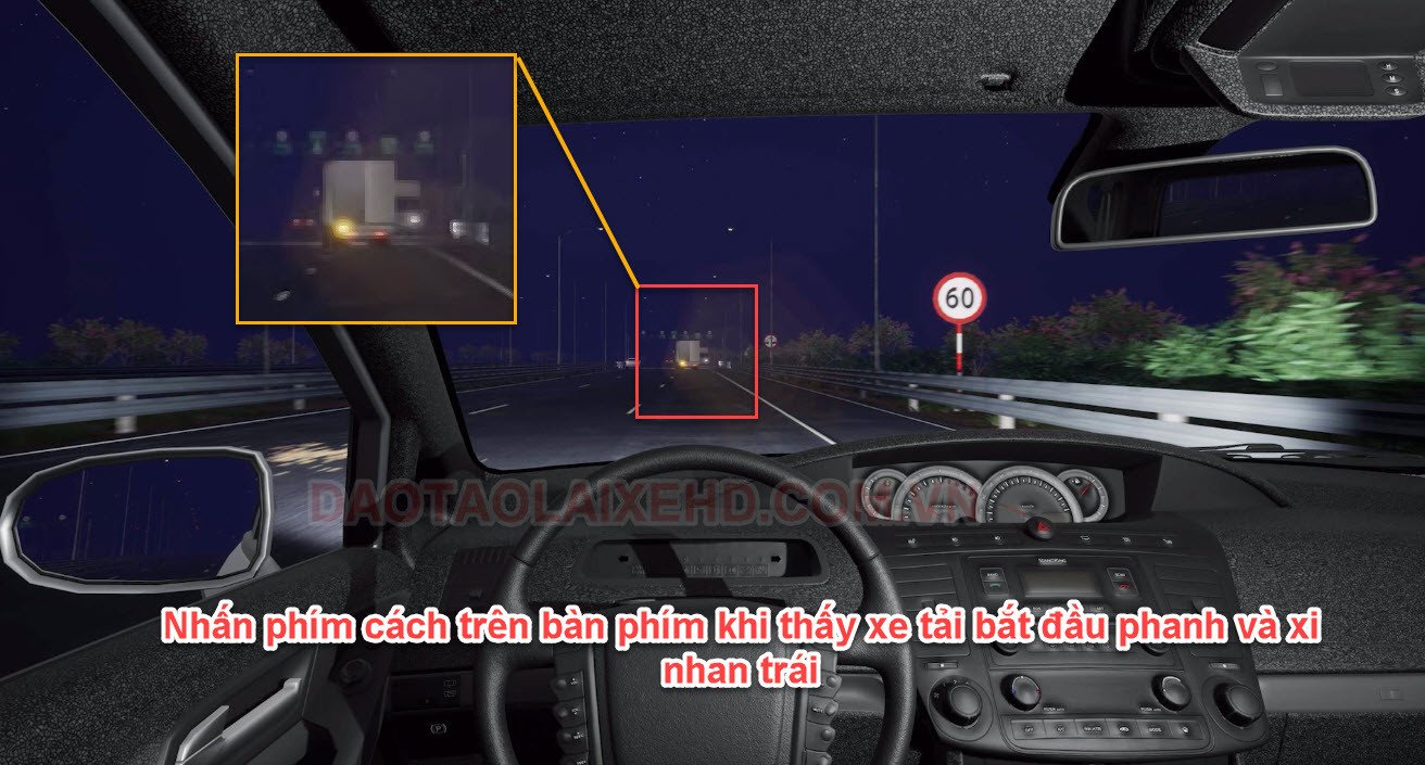 Chiếc xe tải màu trắng đang di chuyển trên đường cao tốc vào ban đêm